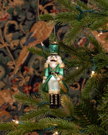 Evergreen Nutcracker Glass Ornament